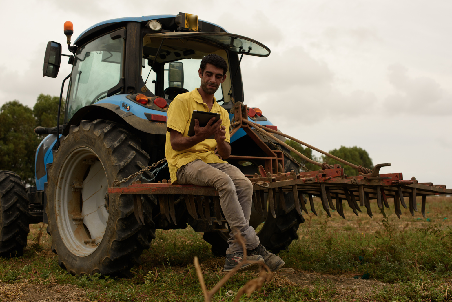 Regenerative Farming Farmer Sitting on a Tractor